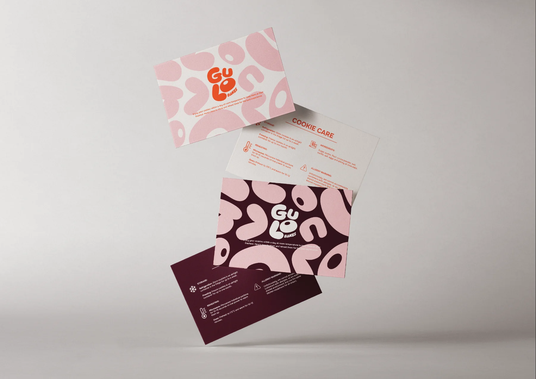 Gulo Bakes printed cards, including cookie-care information in the pink, chocolate and orange palette.