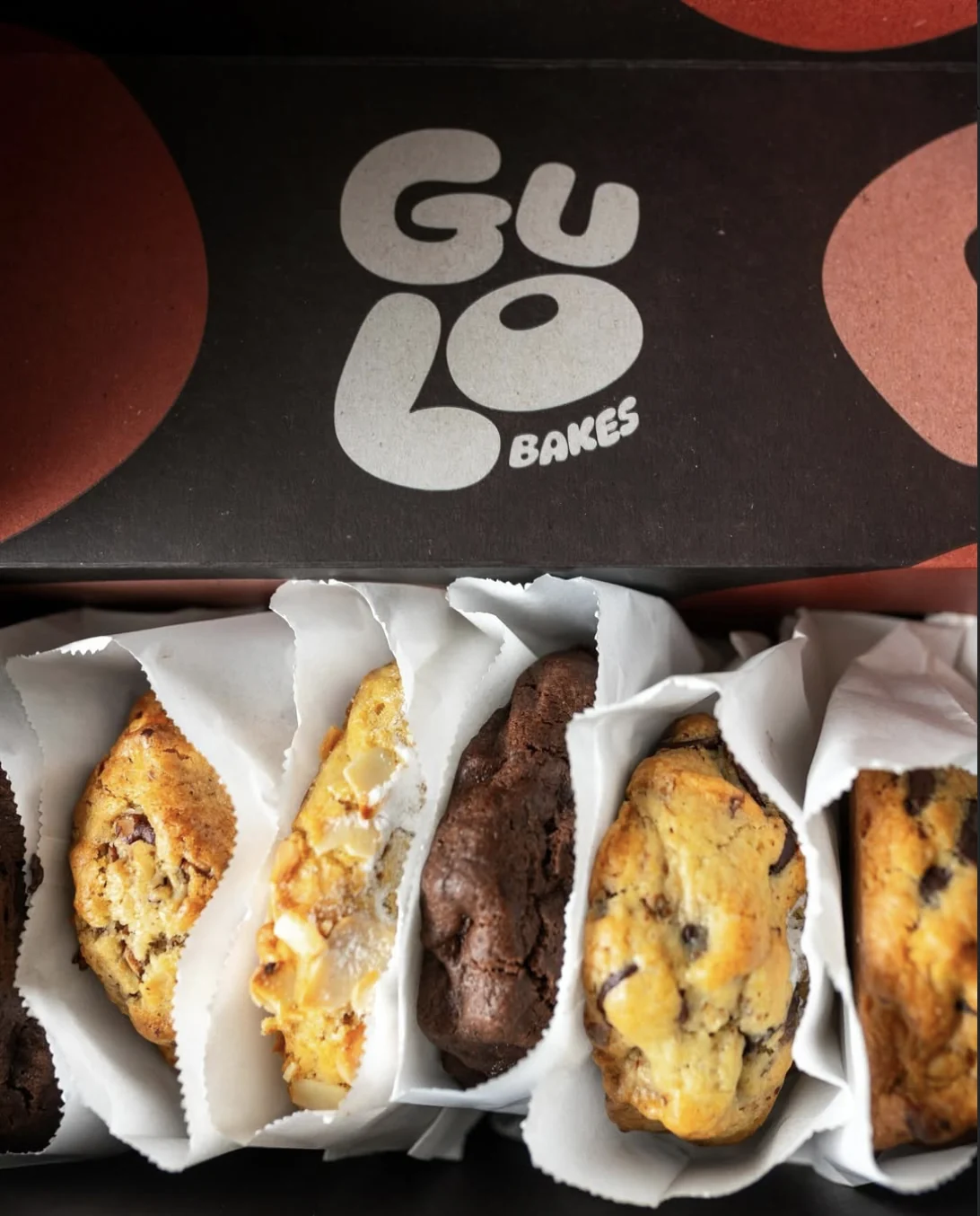 Project photograph of cookies in a Gulo Bakes box with the identity printed on the lid.